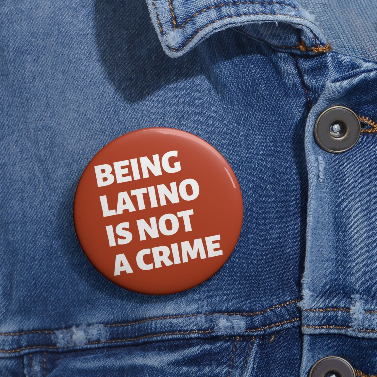 Button: "Being Latino Is Not a Crime"
