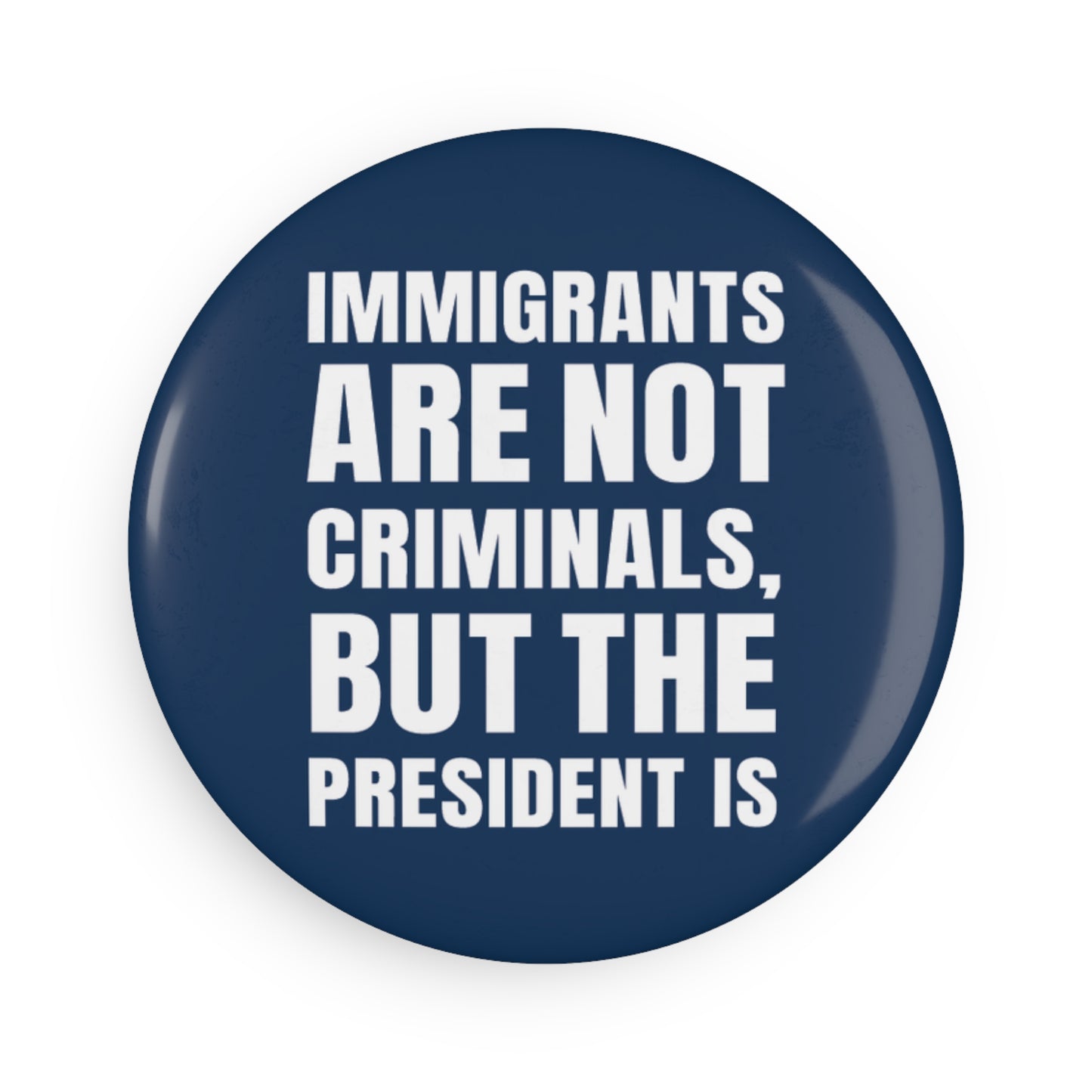 Button: "Immigrants Are Not Criminals, But the President Is"