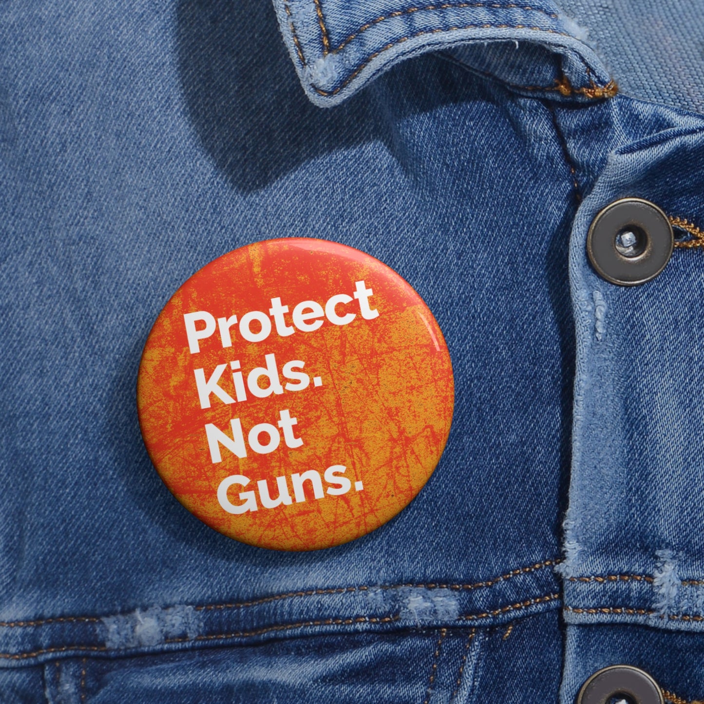 Button: "Protect Kids. Not Guns."