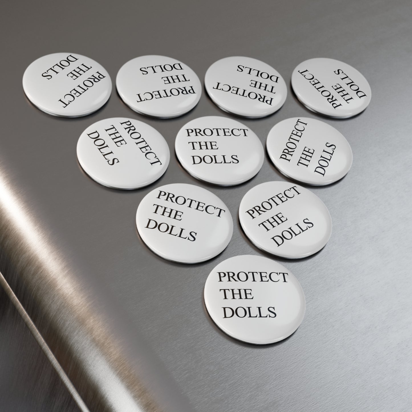Magnet: "Protect the Dolls"