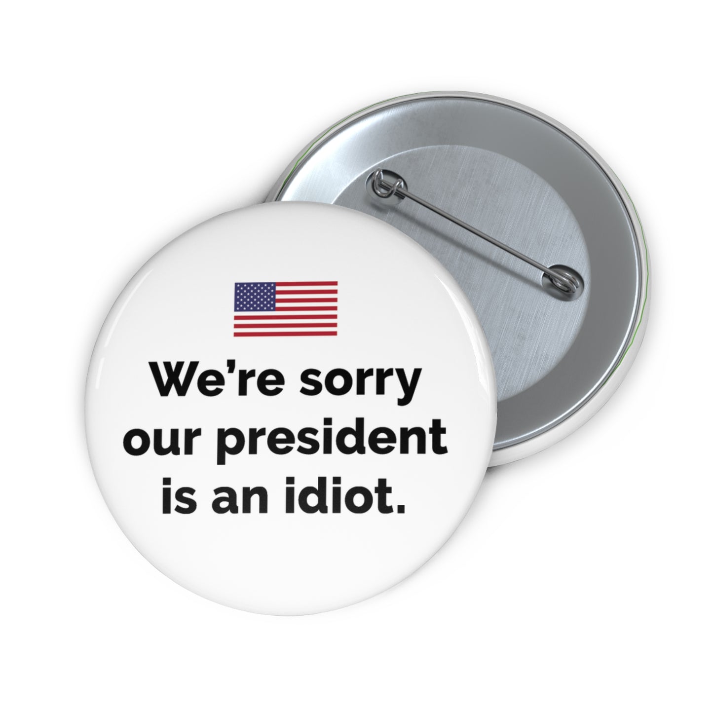 Button: "We're Sorry Our President Is an Idiot," with American Flag