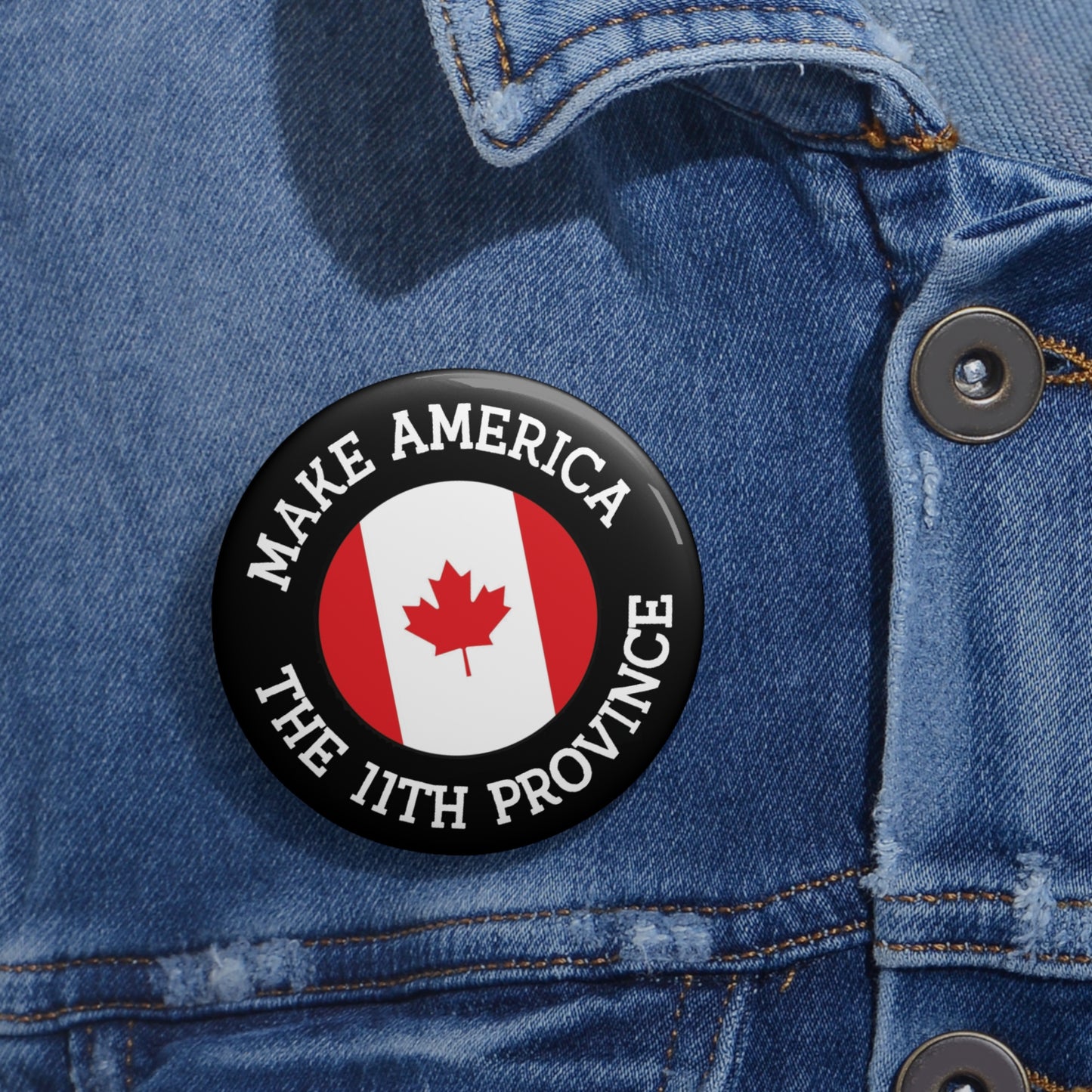 Button: "Make America the 11th Province," with Canadian Flag