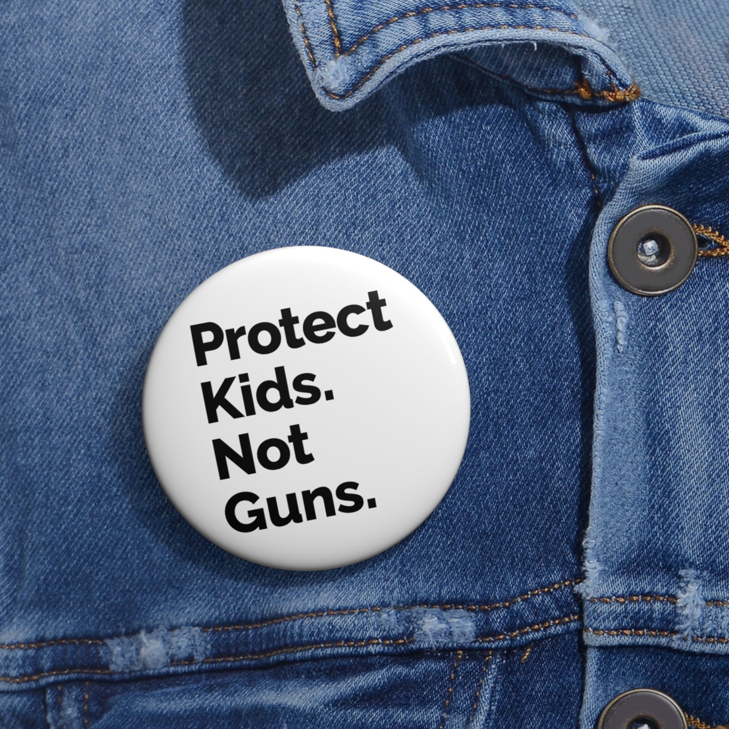 Button: "Protect Kids. Not Guns."