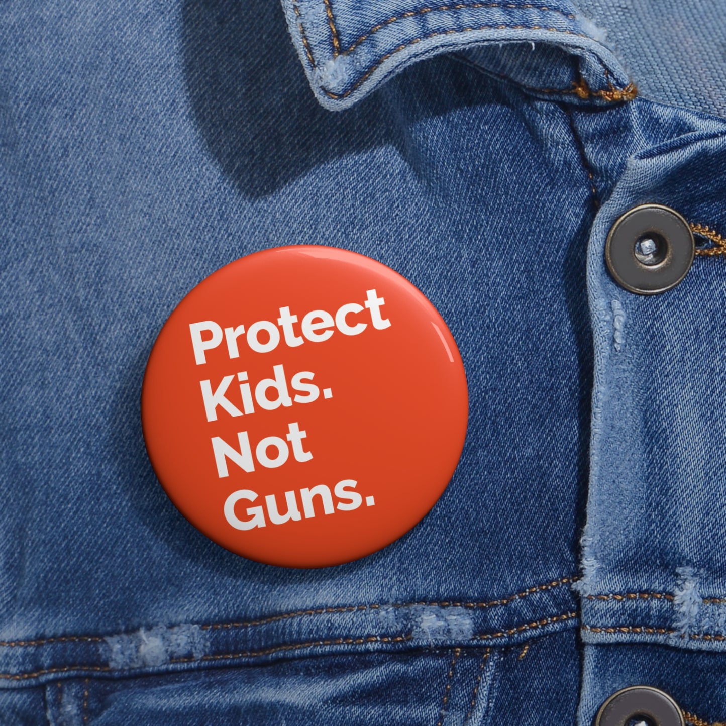 Button: "Protect Kids. Not Guns."